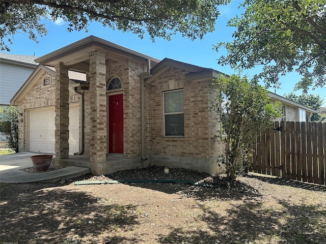 view of front of home with a garage