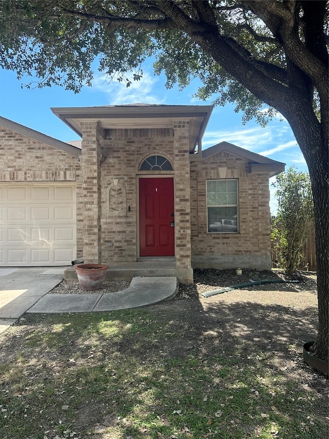 view of front of property featuring a garage