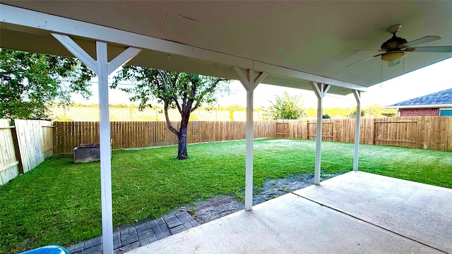 view of patio featuring ceiling fan