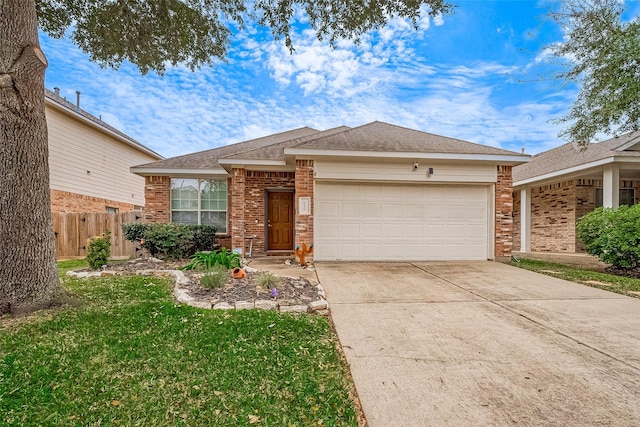 single story home with a front lawn and a garage