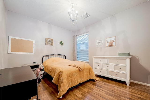 bedroom with light wood-type flooring