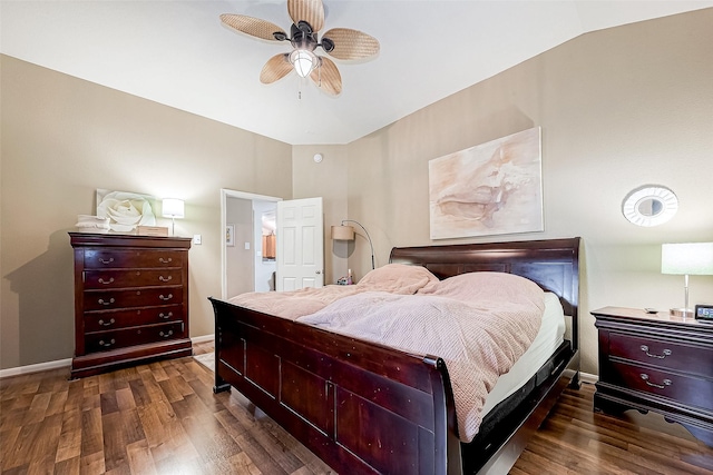 bedroom with ceiling fan, dark hardwood / wood-style flooring, and lofted ceiling