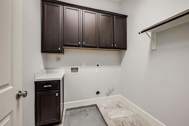 laundry room with cabinets, washer hookup, hookup for a gas dryer, and hookup for an electric dryer