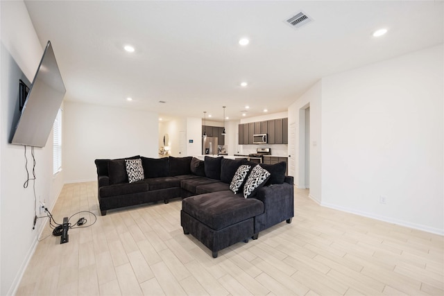 living room with light wood-type flooring