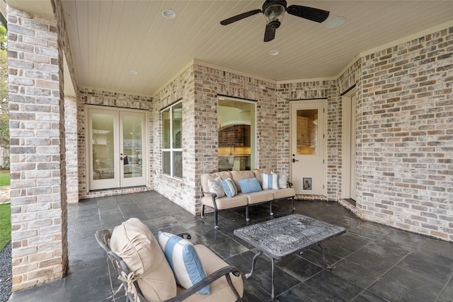 view of patio featuring french doors, ceiling fan, and an outdoor living space