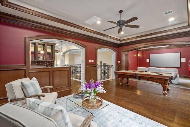 game room featuring billiards, wood-type flooring, ornamental molding, and ceiling fan