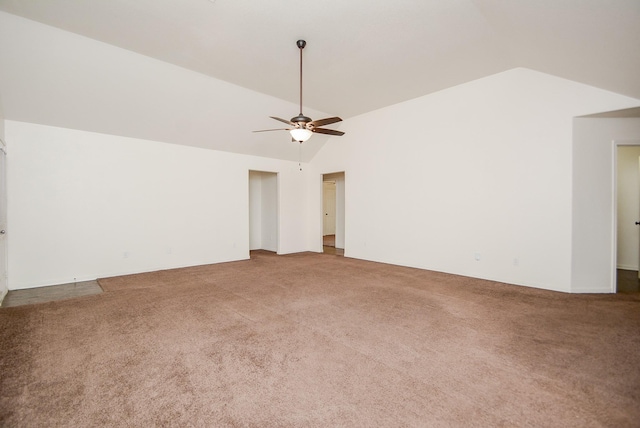 interior space with lofted ceiling and ceiling fan