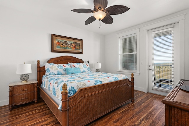 bedroom with ceiling fan, dark wood-type flooring, and access to exterior