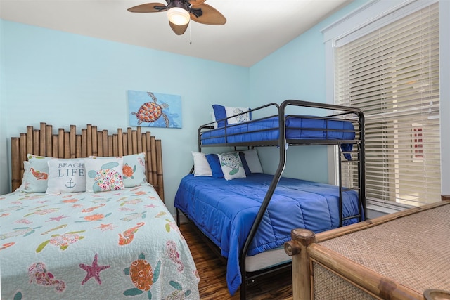 bedroom featuring ceiling fan and dark hardwood / wood-style flooring