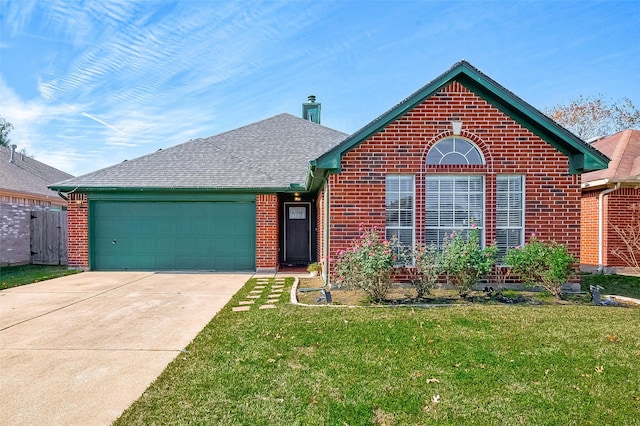 view of front facade featuring a garage and a front yard