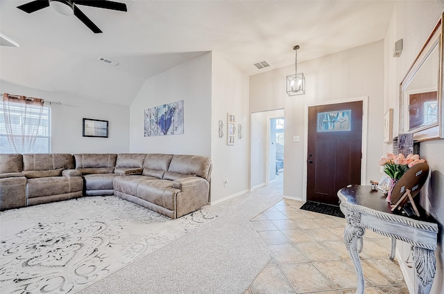 tiled foyer entrance featuring lofted ceiling and ceiling fan