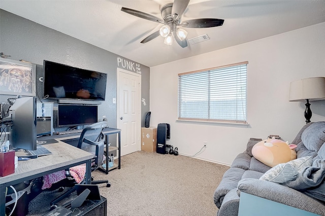 office space with carpet floors and ceiling fan