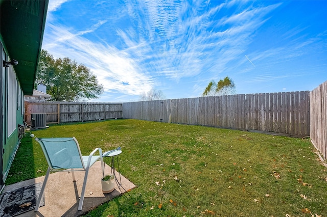 view of yard featuring central AC