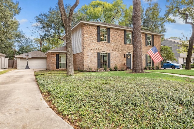 view of front facade with a garage and a front yard