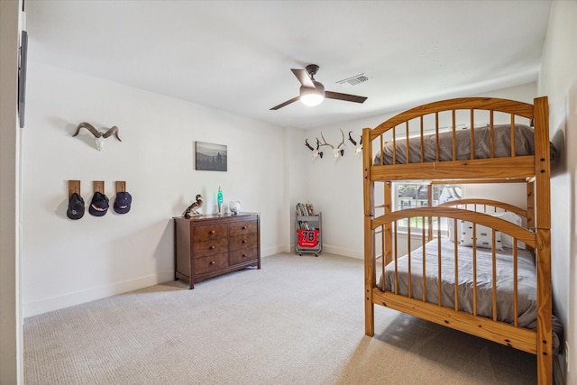 bedroom featuring ceiling fan and carpet floors