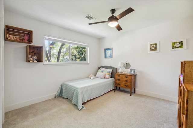 carpeted bedroom with ceiling fan