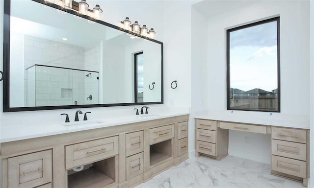 bathroom with a shower with shower door and vanity