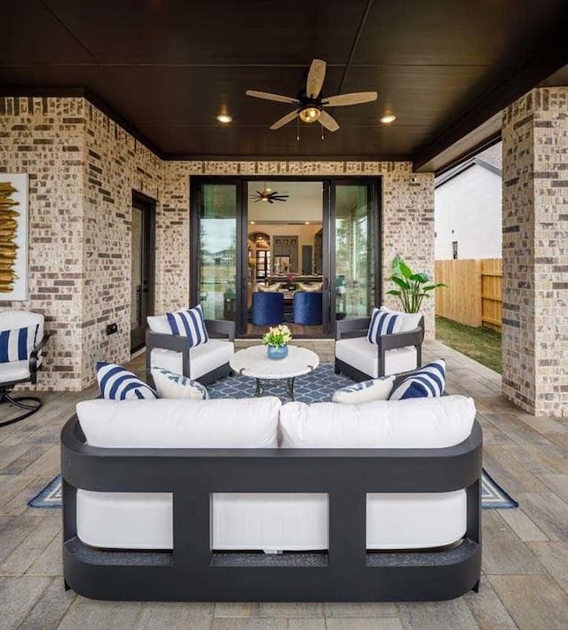 view of patio featuring ceiling fan and an outdoor living space