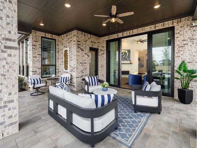 view of patio / terrace with ceiling fan and an outdoor hangout area