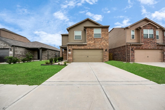 view of front of home featuring a garage and a front lawn