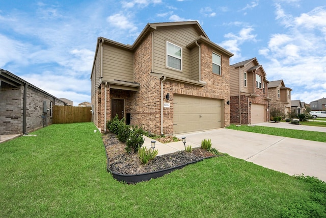 view of front of home featuring a front yard and a garage