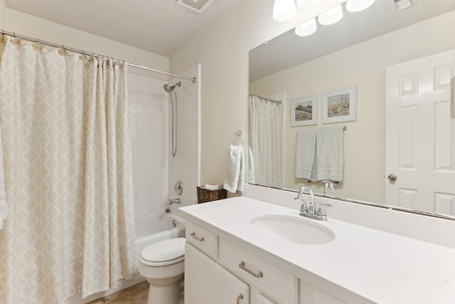 full bathroom with toilet, vanity, tile patterned floors, and shower / bath combination with curtain