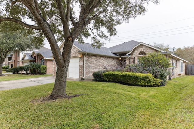 ranch-style house with a garage and a front lawn