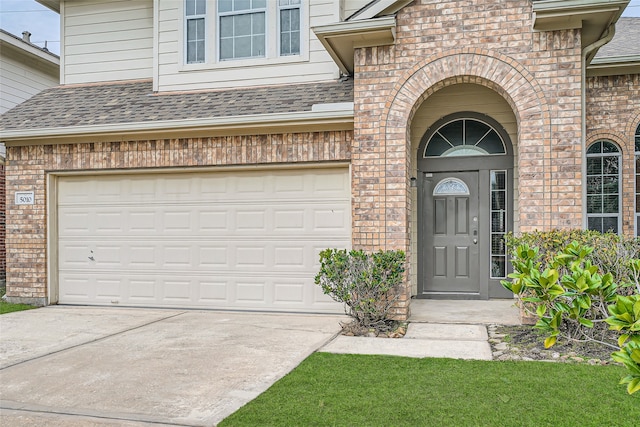 entrance to property with a garage