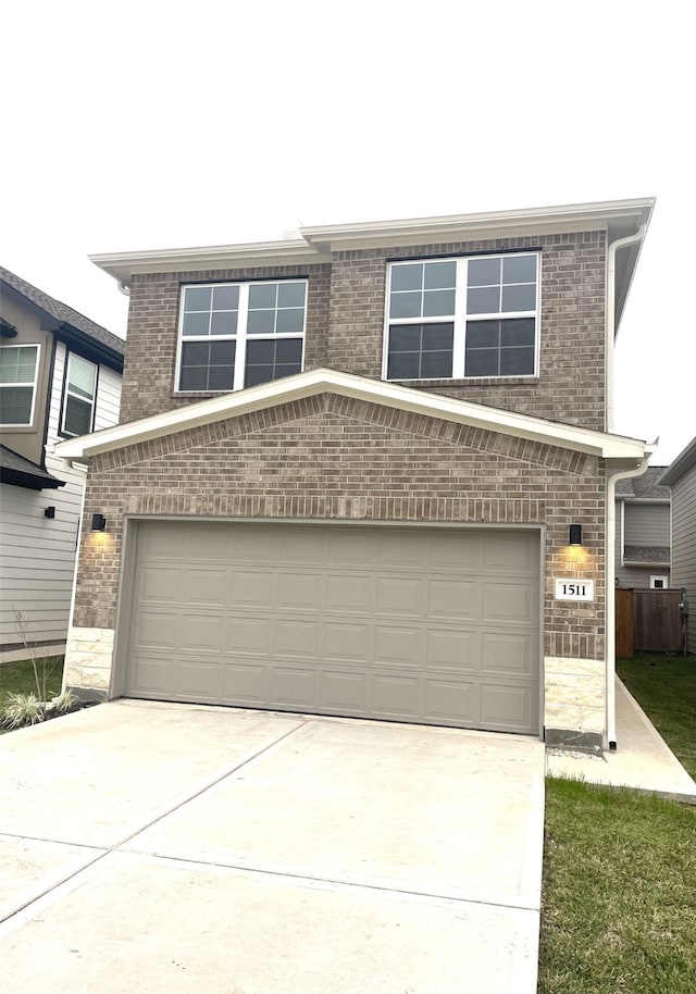 view of front of property featuring a garage