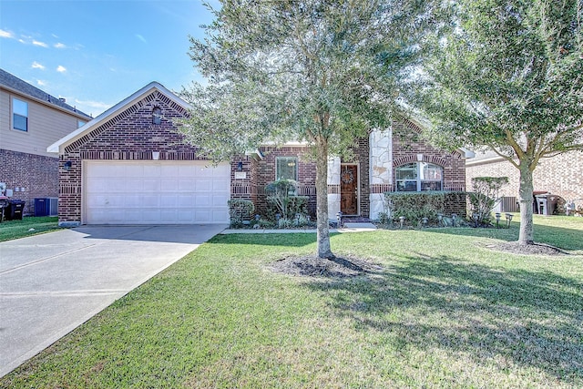 view of front of property with a garage and a front lawn