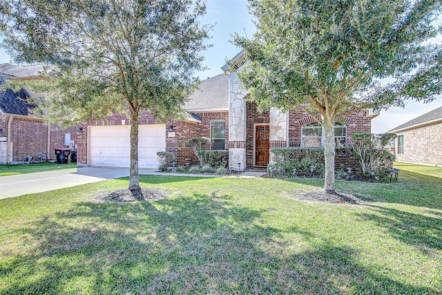 view of front of property with a front lawn and a garage