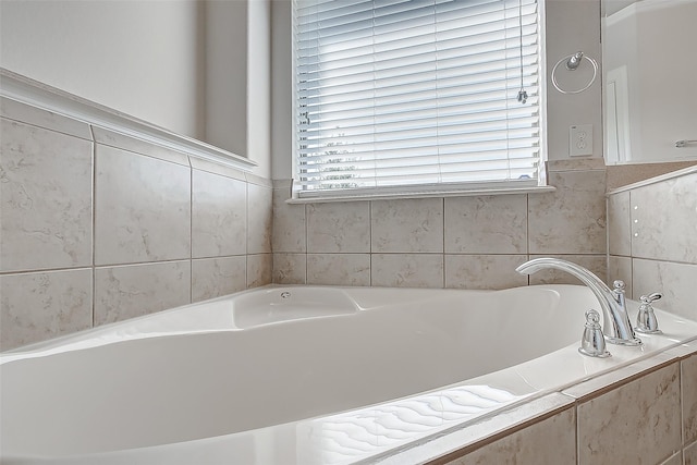 bathroom featuring a tub