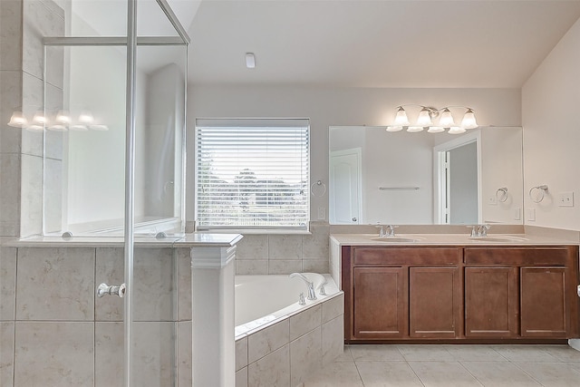 bathroom with separate shower and tub, tile patterned flooring, and vanity