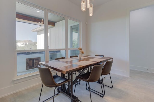 dining room featuring a notable chandelier