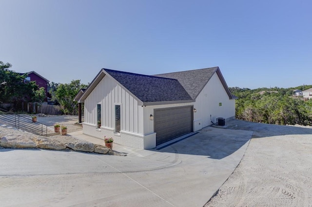 view of home's exterior with central AC