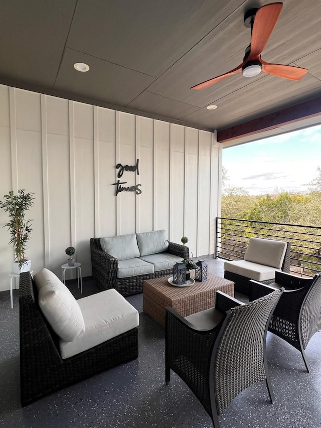 view of patio featuring ceiling fan and outdoor lounge area