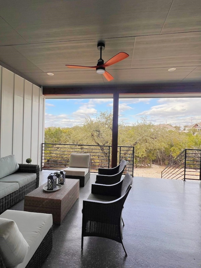 view of patio with ceiling fan and an outdoor hangout area