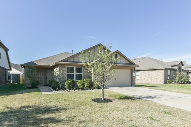 view of front facade with a front yard and a garage