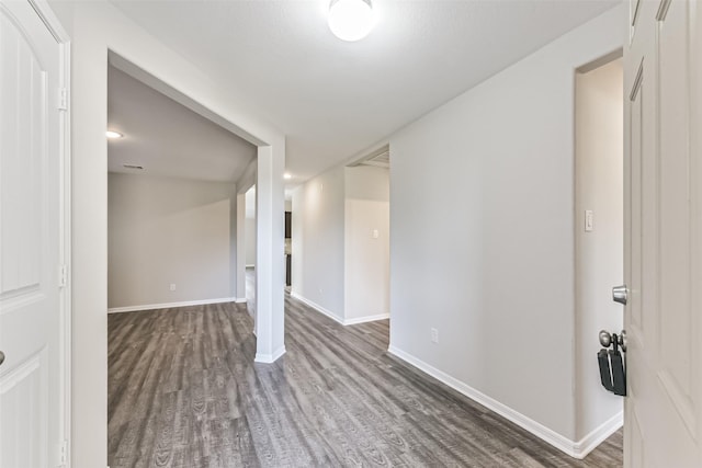 empty room featuring dark hardwood / wood-style floors