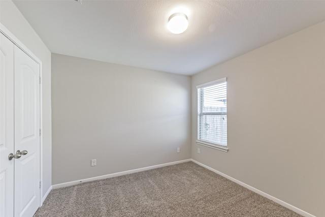 spare room with carpet flooring