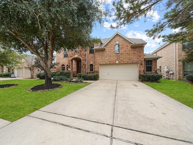 view of front property with a front yard and a garage