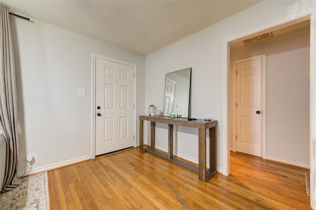 entrance foyer featuring light wood-type flooring