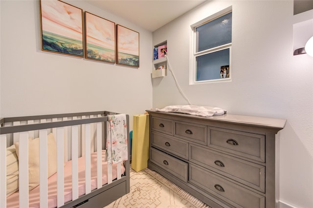 bedroom with a crib