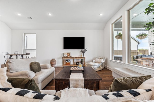 living room with vaulted ceiling