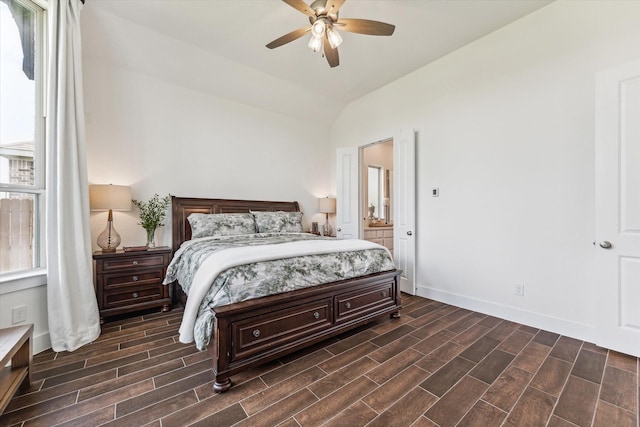 bedroom featuring lofted ceiling, ceiling fan, and multiple windows