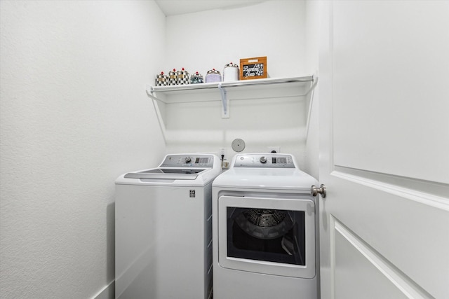 laundry area with washer and dryer