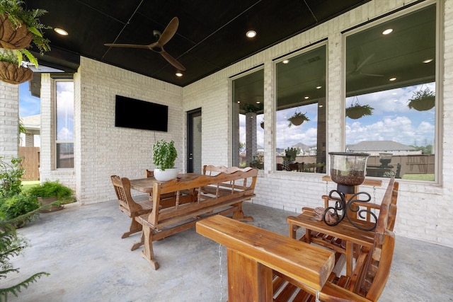 view of patio / terrace featuring ceiling fan