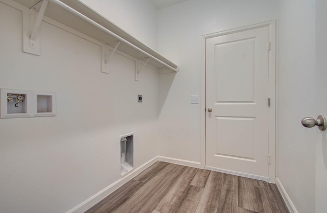 washroom featuring hookup for a washing machine, hardwood / wood-style flooring, and hookup for an electric dryer