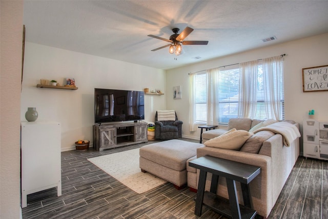 living room featuring ceiling fan