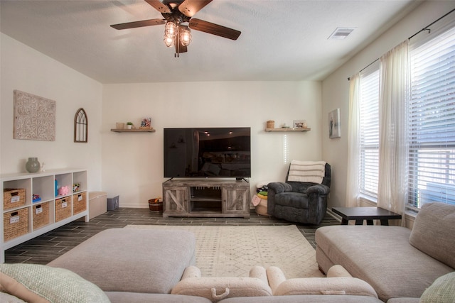 living room with ceiling fan